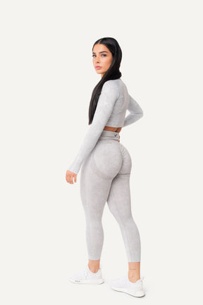 Veleur Faded Leggings für Damen, High-Waisted, figurbetontes Design mit Scrunch-Effekt und leichtem washed-out-Look, atmungsaktives Material, perfekt für Gym und Freizeit.