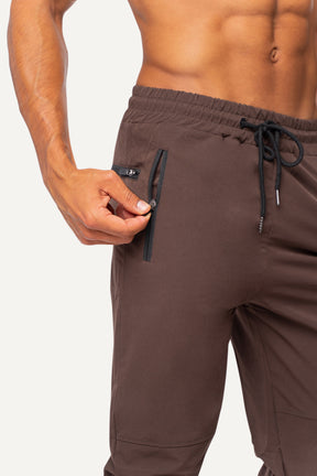 Veleur All Day Tracksuit für Herren, bequemer Trainingsanzug mit elastischem Bund und Zipp-Tasche, ideal für Outdoor-Aktivitäten und vielseitige Tagesprogramme.