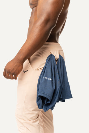 Veleur All Day Tracksuit für Männer, bequemer Trainingsanzug mit elastischem Bund und Zipp-Tasche, ideal für Outdoor-Aktivitäten und vielseitige Tagesprogramme.