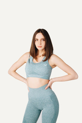 Veleur Endure Set für Damen, nahtloses Design, integrierte Tasche, atmungsaktiver Stoff, ideal für Laufen und Fitness.